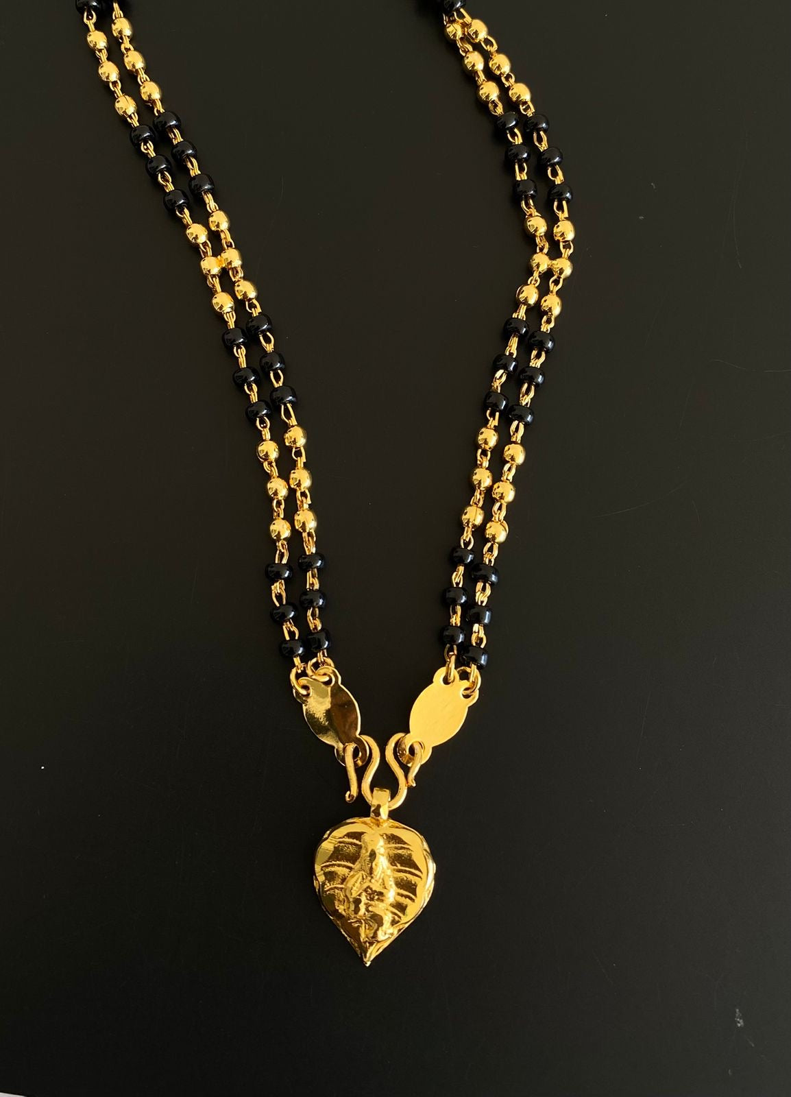 Gold tone black krishna pendant karimani mala/chain dj-36875