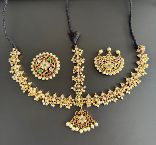 Gold tone precious kemp-green-white pearl cluster with sun and moon head set dj-51849