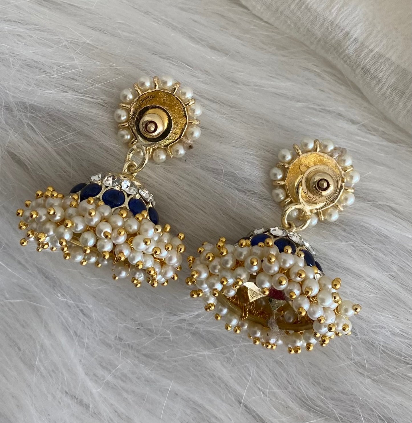 Gold tone precious white-blue stone pearl jhumkka dj-53908
