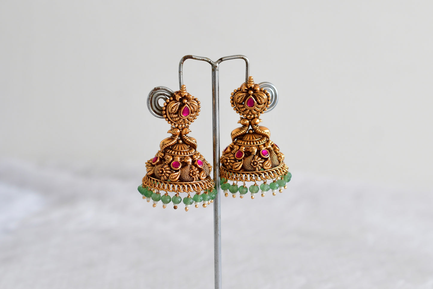 Antique gold tone pink green beaded swan jhumkka dj-52504