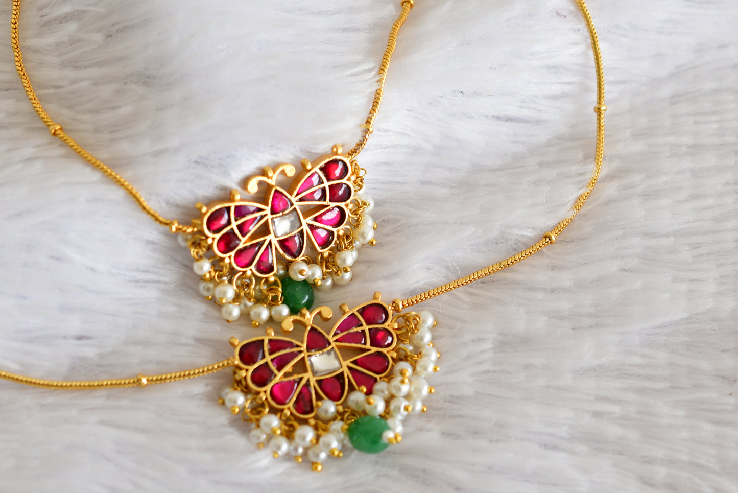 Gold tone pink-green pearl butterfly kundan jadau anklets dj-52388