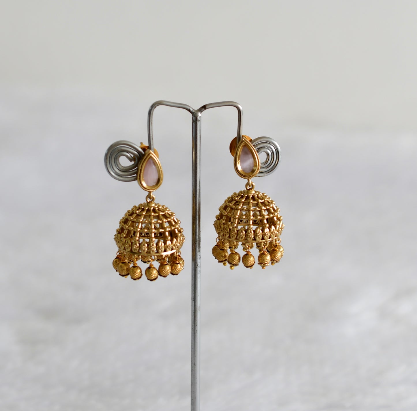 Antique gold tone baby pink thilak stone pearl jhumkka dj-51850