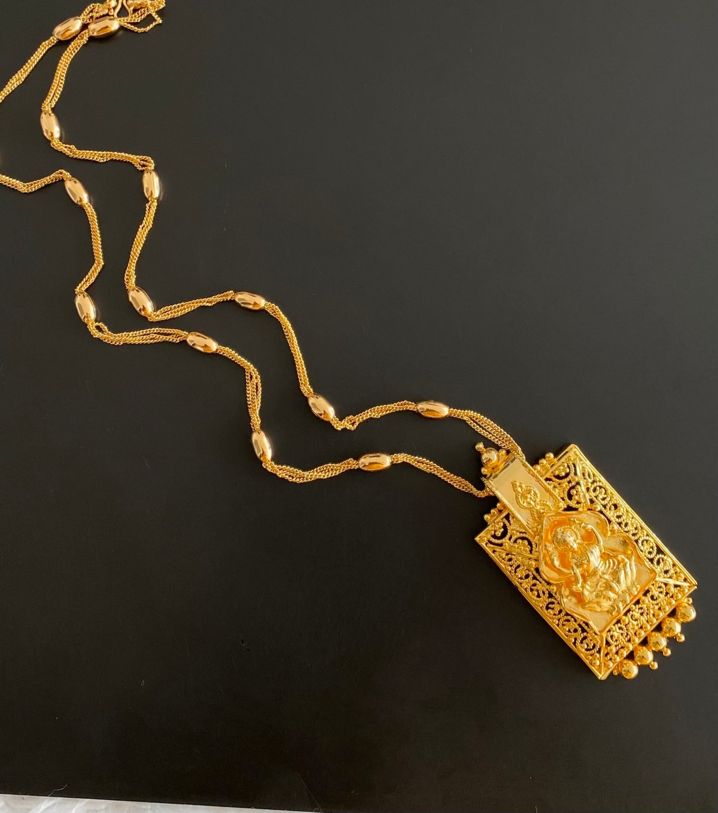 Gold tone 24 inches chain with lakshmi pendant dj-54360