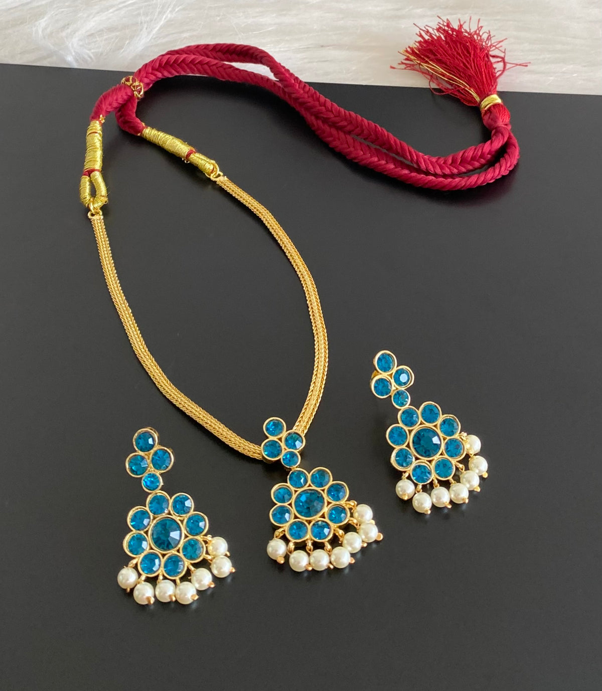 Gold tone AD cerulean blue stone pearl attigai flower necklace set dj-55140