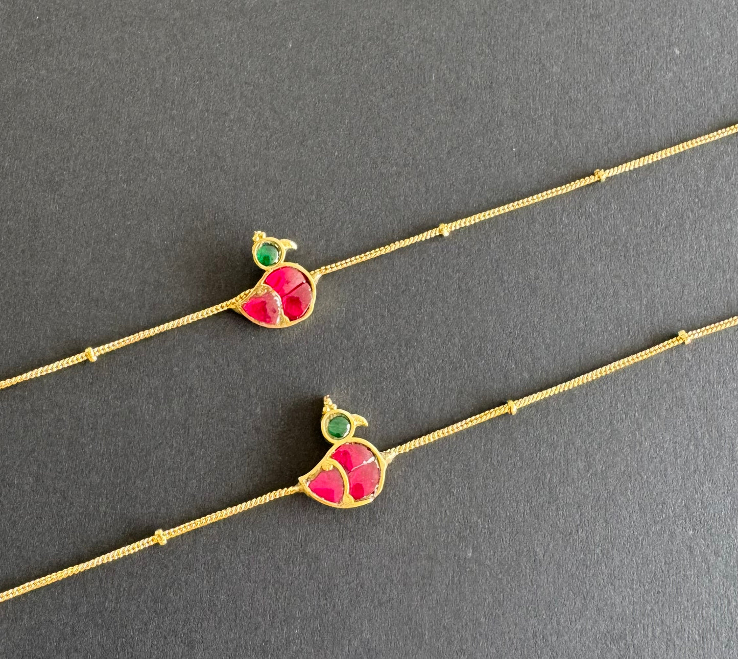 Gold tone pink-green bird kundan jadau anklets dj-51410