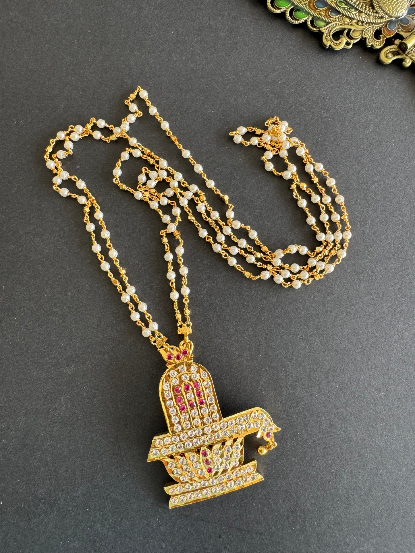 Gold tone 24 inches chain with AD shiva lingam pendant dj-52225
