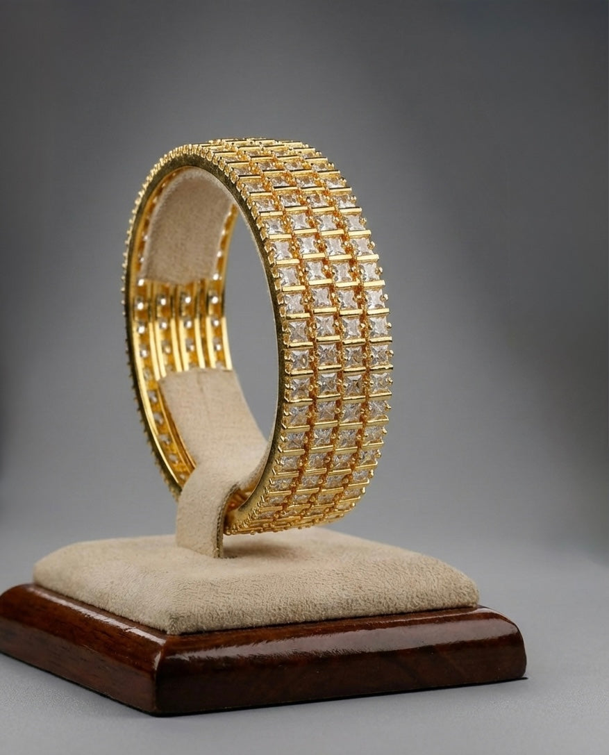 Gold tone cz white square stone set of 4 bangles(2.10) dj-45626
