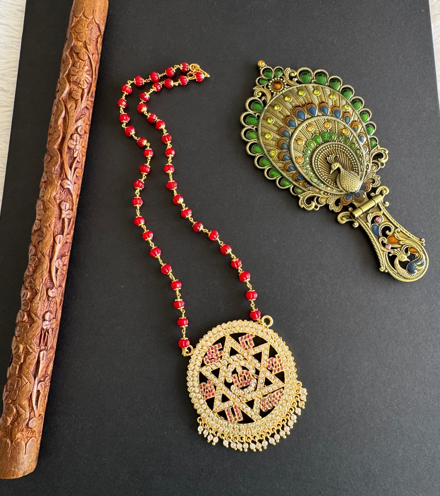 Gold tone maroon beaded chain with Tamil “Om Saravana Bhava” pendant dj-52227