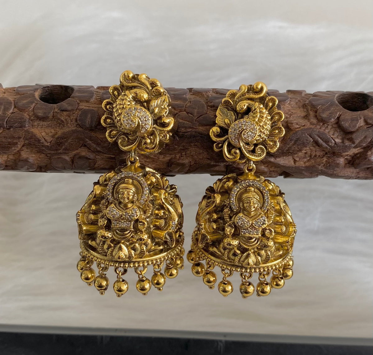 Antique gold tone cz white nakshi peacock lakshmi jhumkka dj-55101