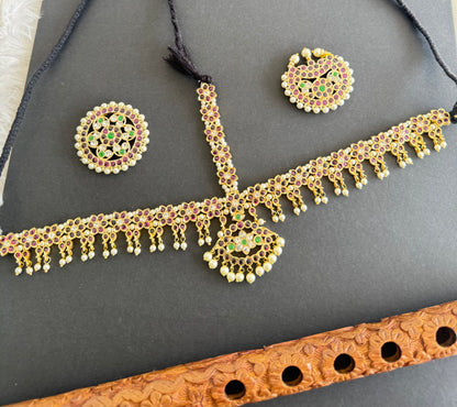 Gold tone precious kemp-green-white pearl cluster with sun and moon head set/tikka dj-52014