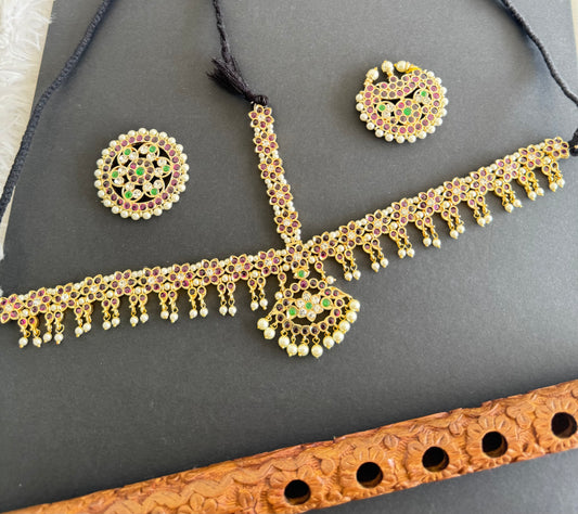 Gold tone precious kemp-green-white pearl cluster with sun and moon head set/tikka dj-52014