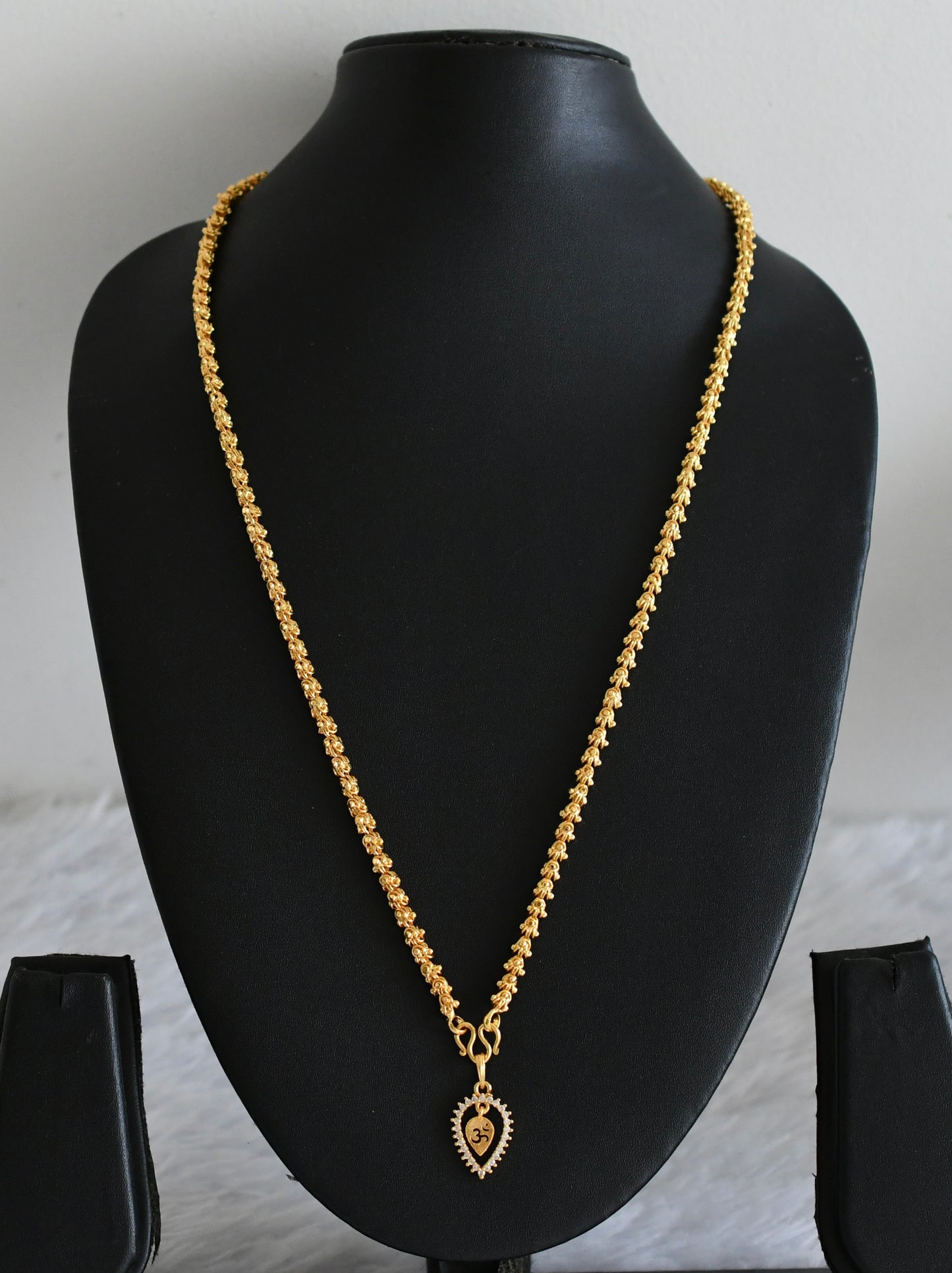 Gold tone chian with white stone om pendant dj-53099