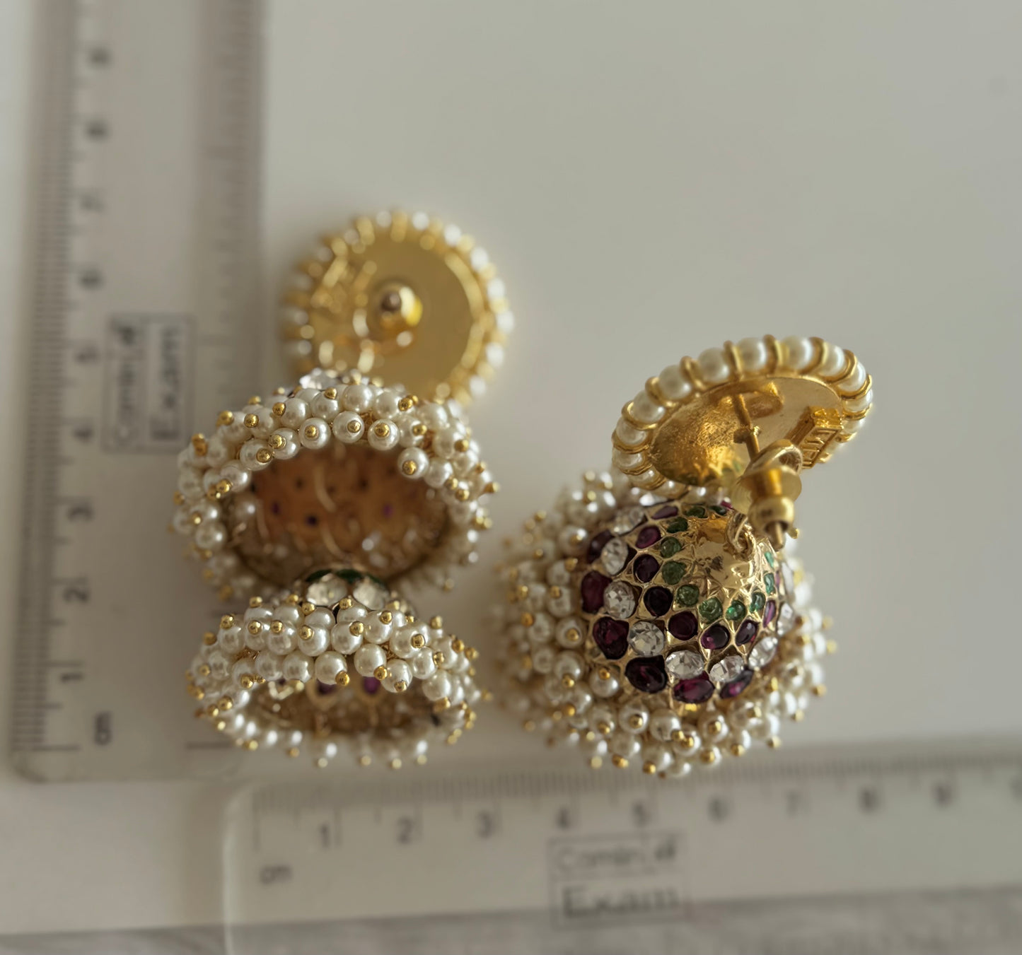 Gold tone precious kemp-green-white stone pearl big step jhumkka dj-51451