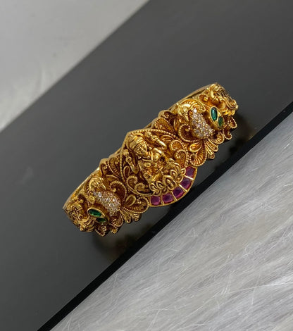 Antique gold tone kemp-green-white stone lakshmi peacock openable kada/bracelet dj-54853