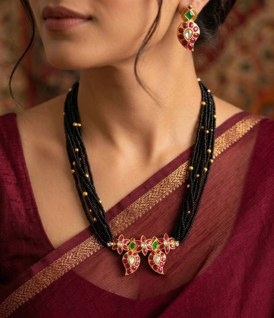 Antique gold tone pink-green-white kundan jadau black beaded set dj-54177