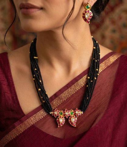 Antique gold tone pink-green-white kundan jadau black beaded set dj-54177