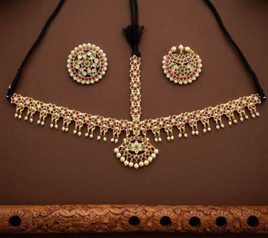 Gold tone precious kemp-green pearl with sun and moon head set/tikka dj-52014
