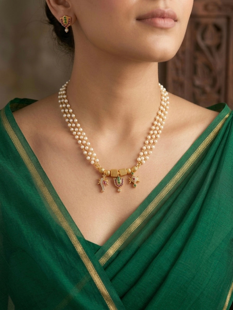 Gold tone ruby-green-white stone shanku-chakra-nama pearl chain set dj-54010