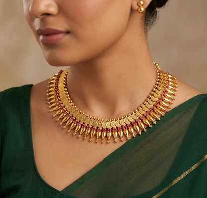 Gold tone kerala style pink stone lakshmi coin necklace dj-54136