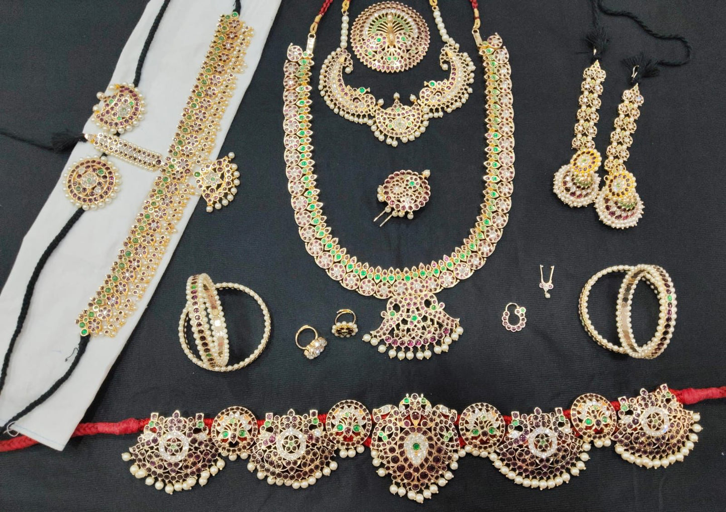 Gold tone precious kemp-green-white pearl mango bridal set dj-53785