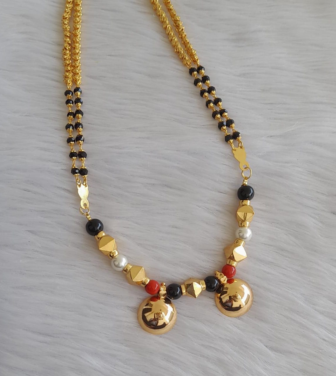 Gold tone 30 inches karimani chain with coral-pearl-black beaded bottu mangalyam dj-43568