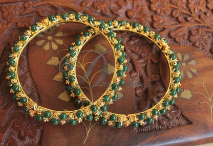 Gold tone green beaded bangles(2.10) dj-48527