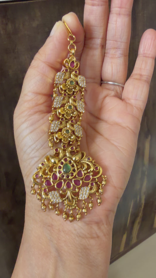 Antique gold tone kemp-green white stone peacock tikka dj-47730