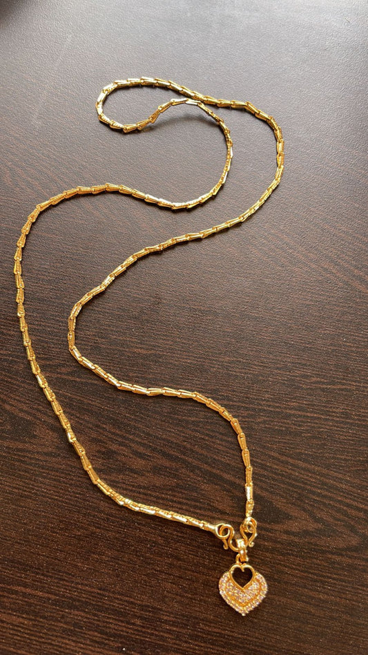 Gold tone heart designer pedant with chain dj-35885