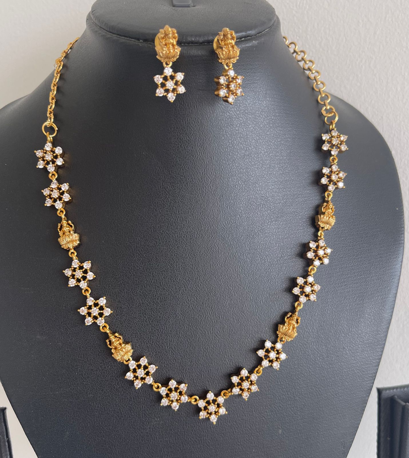 Matte finish white stone Lakshmi necklace set dj-40540