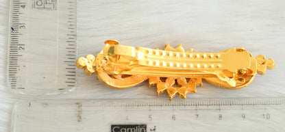 Gold tone kemp temple hair clip dj-14897