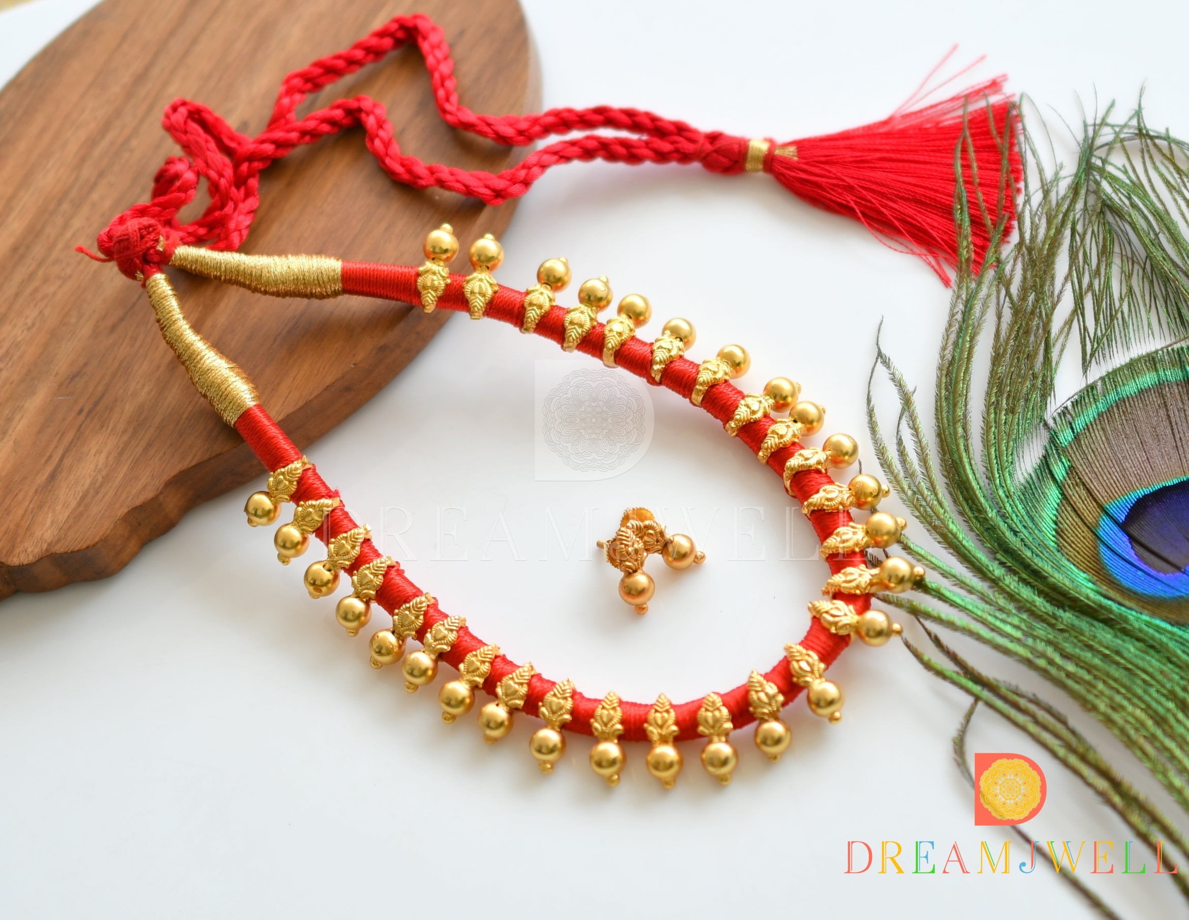 Red on sale thread necklace