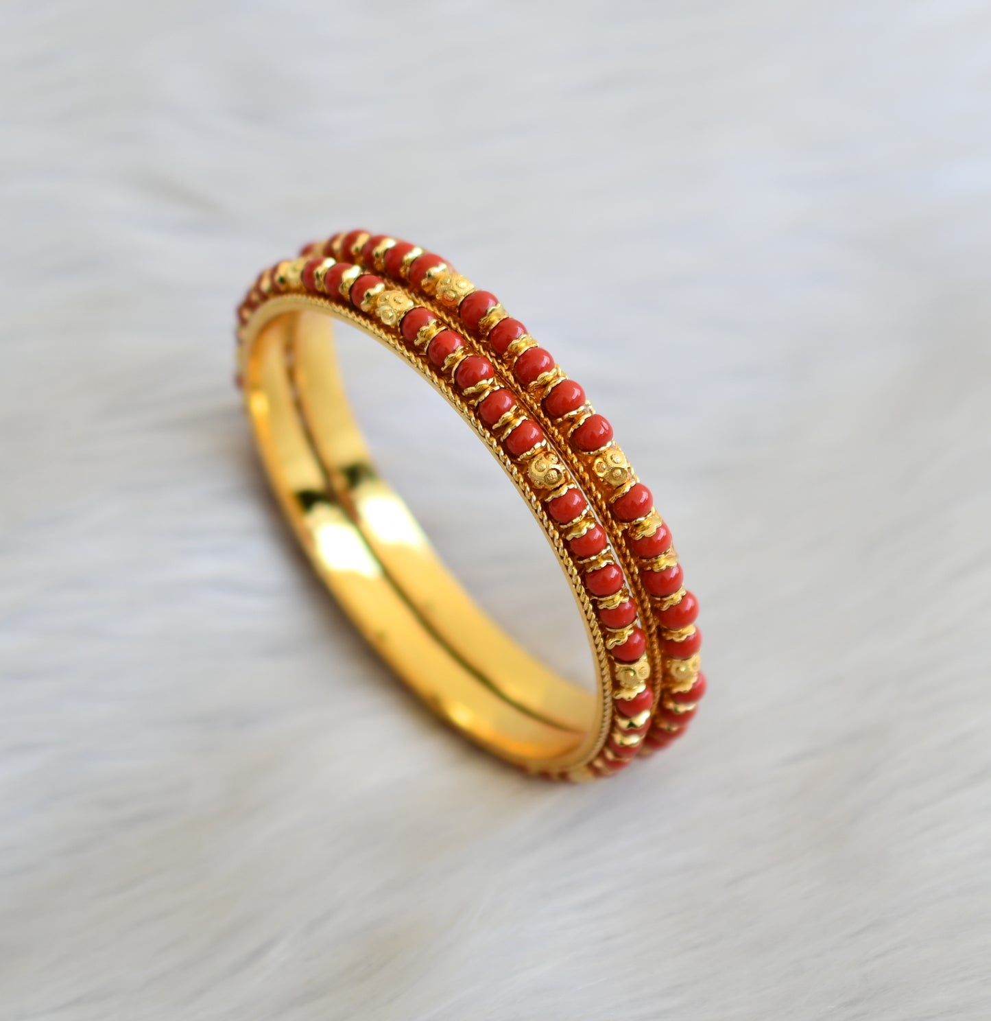 Gold tone coral beaded bangles (2.10) dj-41111