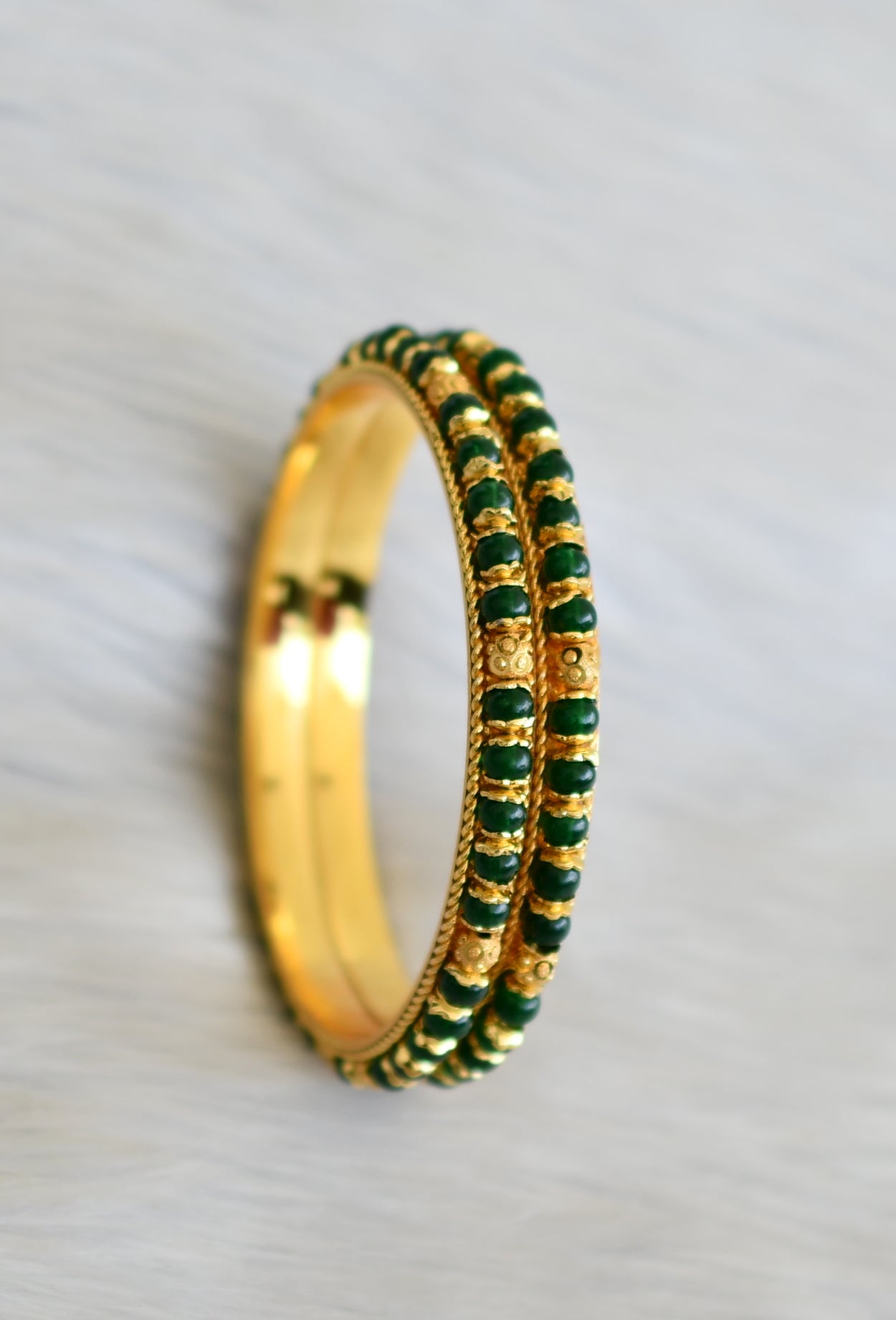 Gold tone green beaded bangles (2.8) dj-41114