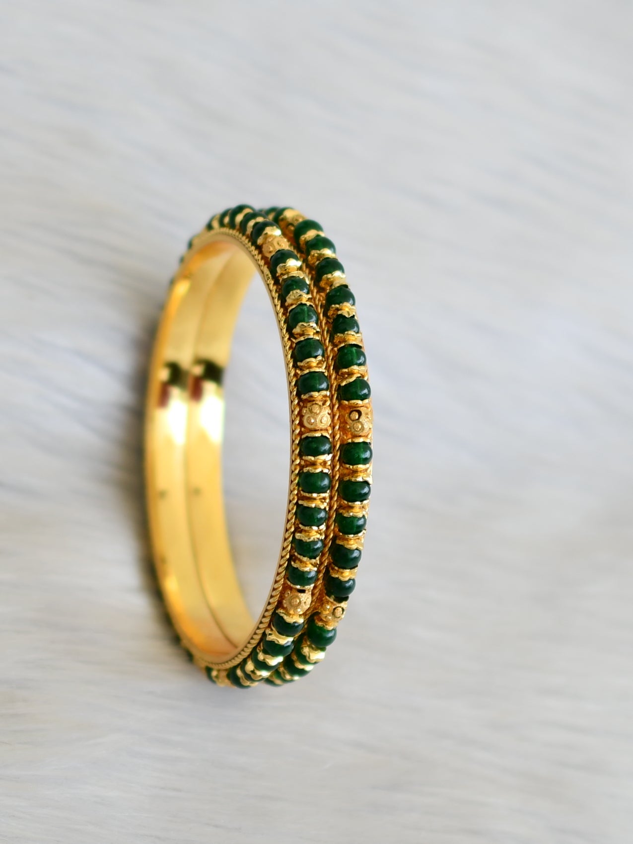 Gold tone green beaded bangles (2.8) dj-41114