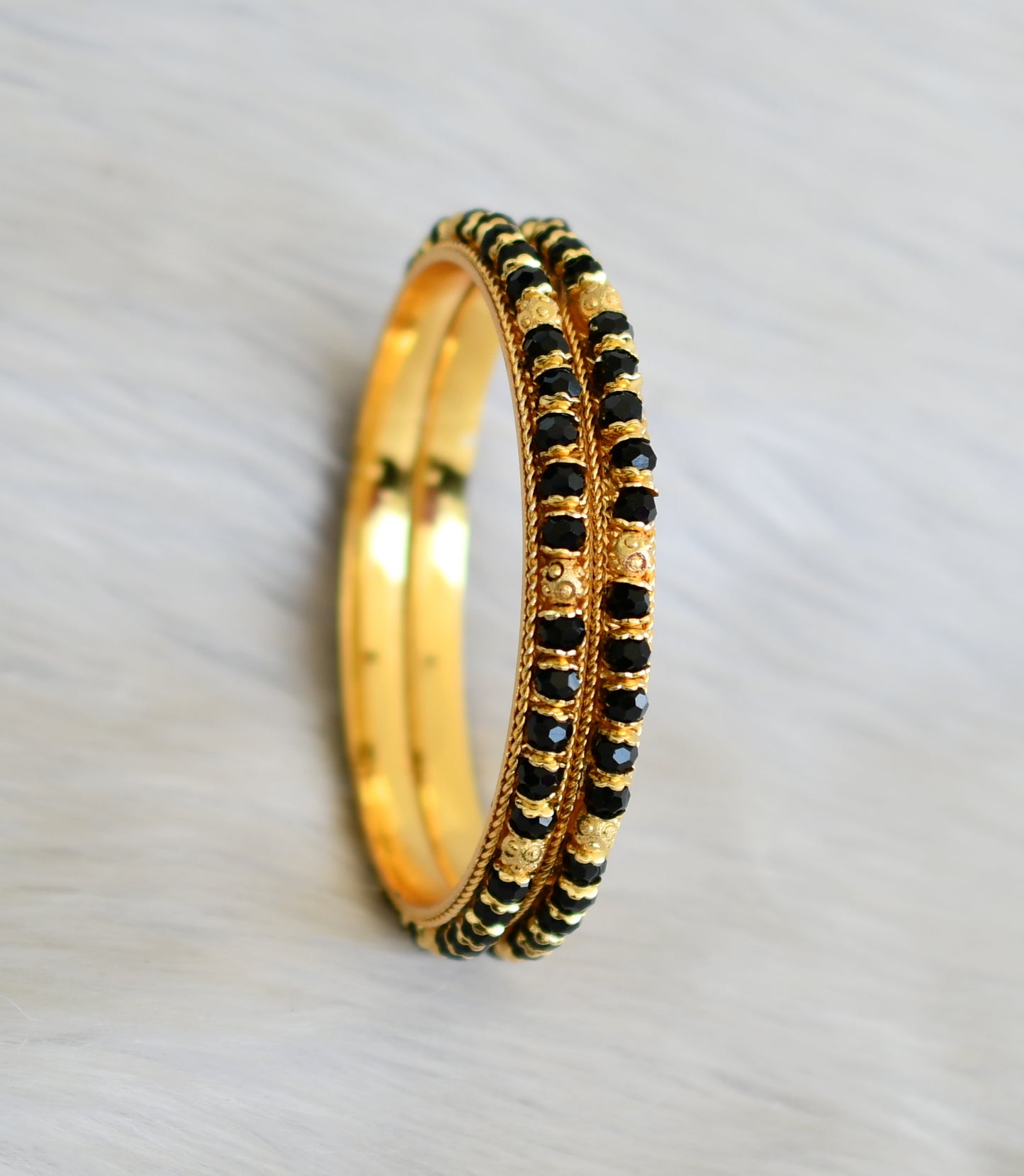 Gold tone black beaded bangles (2.6) dj-41116
