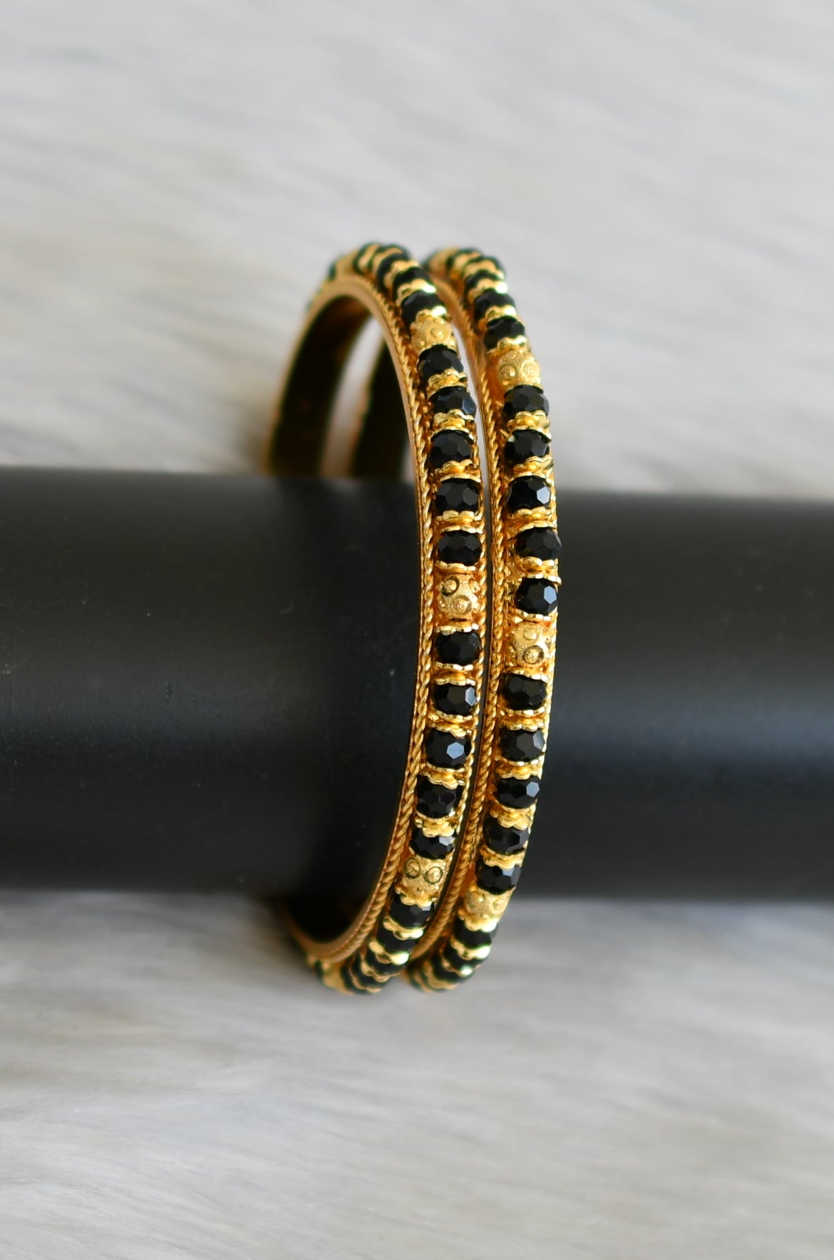 Gold tone black beaded bangles (2.8) dj-41117