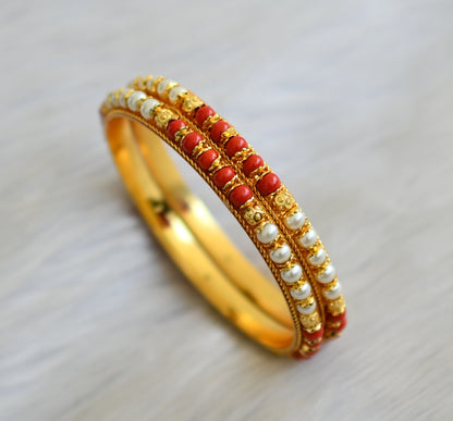 Gold tone coral-pearl beaded bangles(2.8) dj-41122