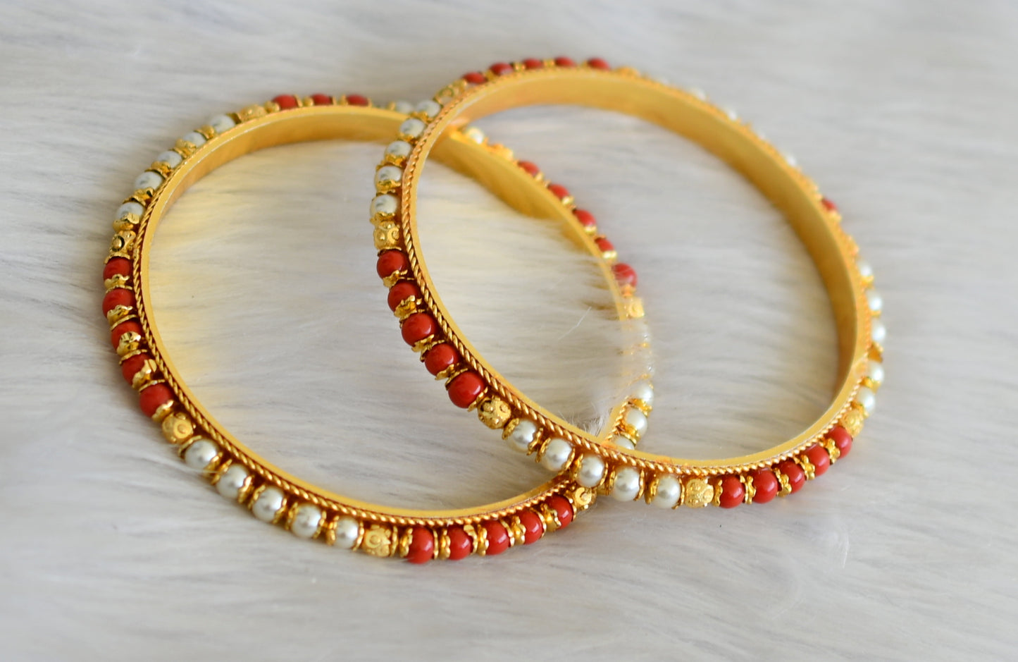 Gold tone coral-pearl beaded bangles(2.4) dj-41120