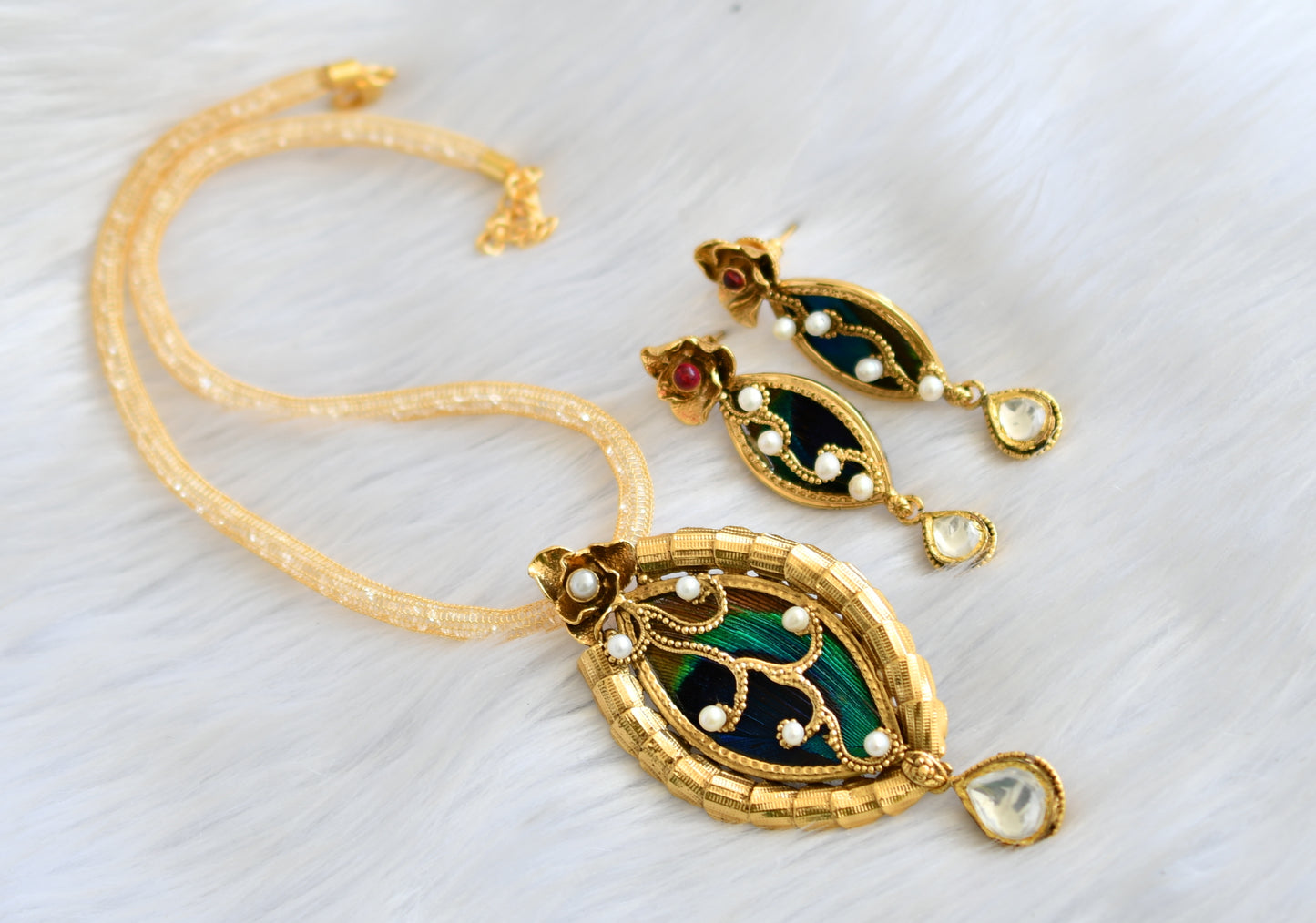 Antique gold tone pearl kundan peacock feather pendant set dj-25371