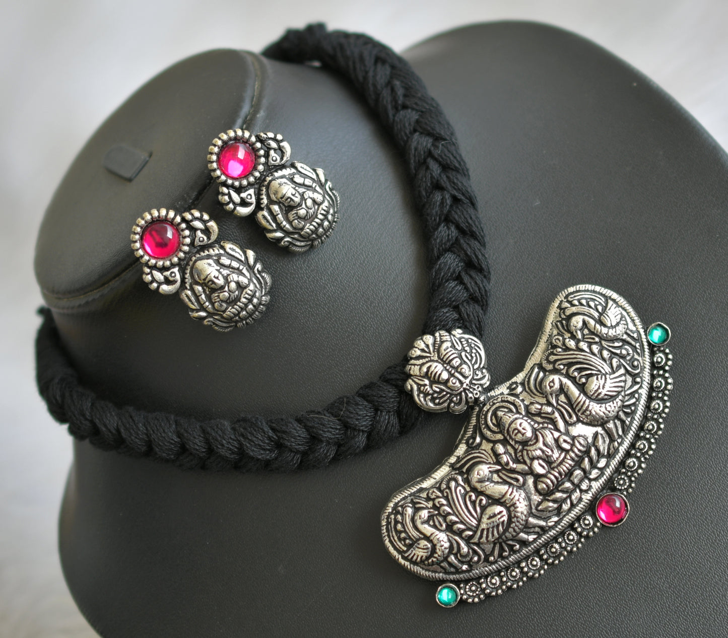 Silver tone pink-green black thread Kolhapuri necklace set dj-40179