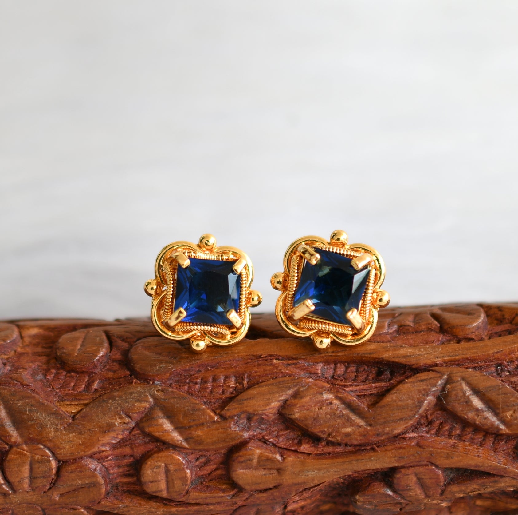 CZ Rose Gold Stud Earrings with Blue Stone  VOYLLA