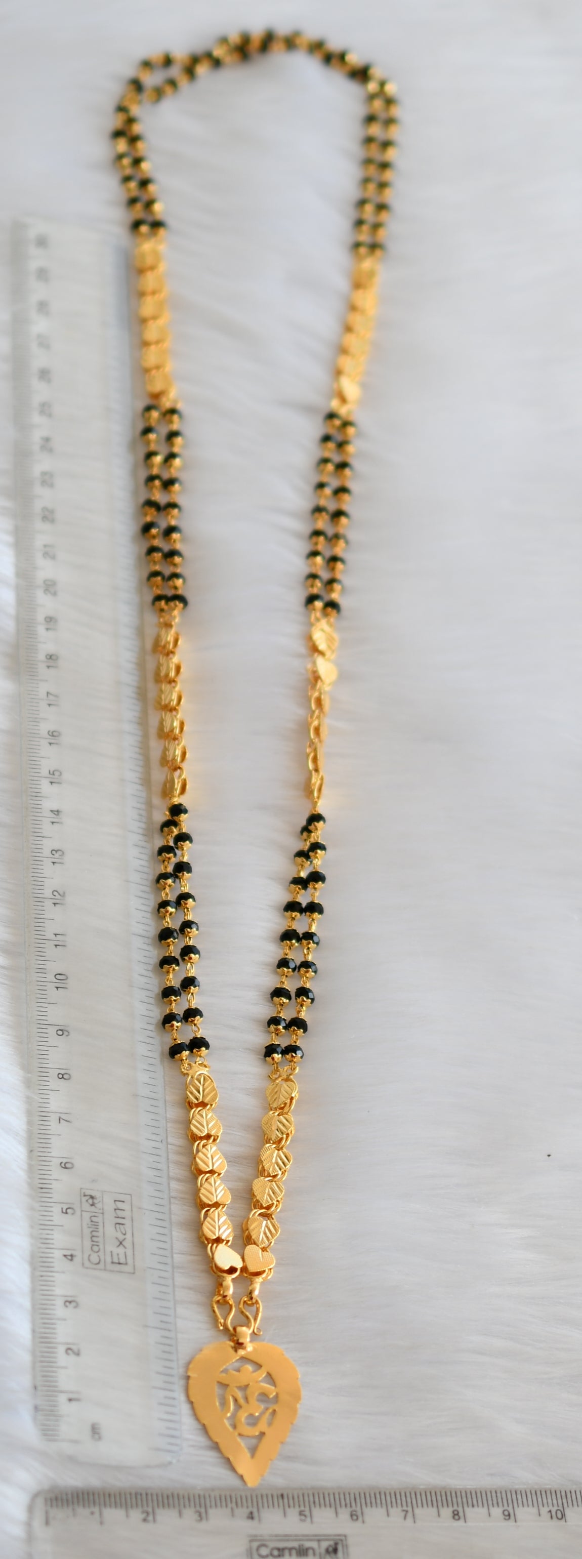 Gold tone black karimani double layer chain 'om' pendant dj-40250
