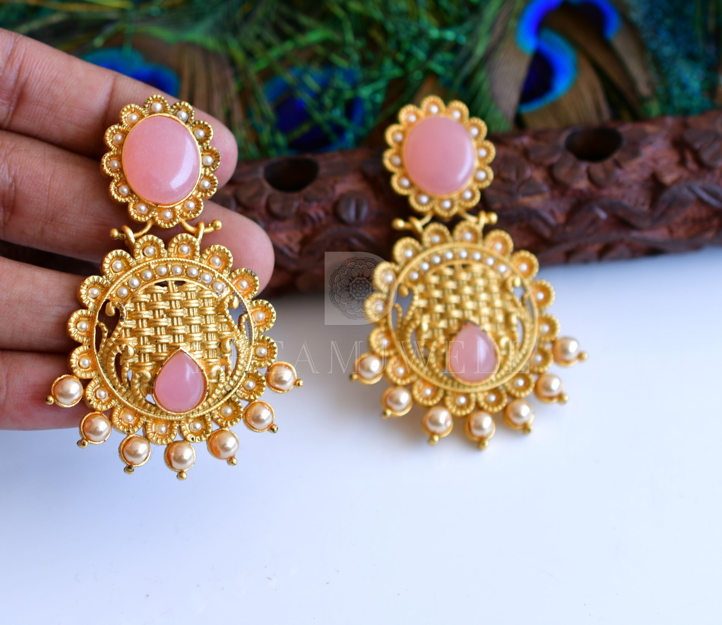 Trending and fashionable jhumka earrings for girls and women.High quality Jhumka  earrings for party wear purposes.