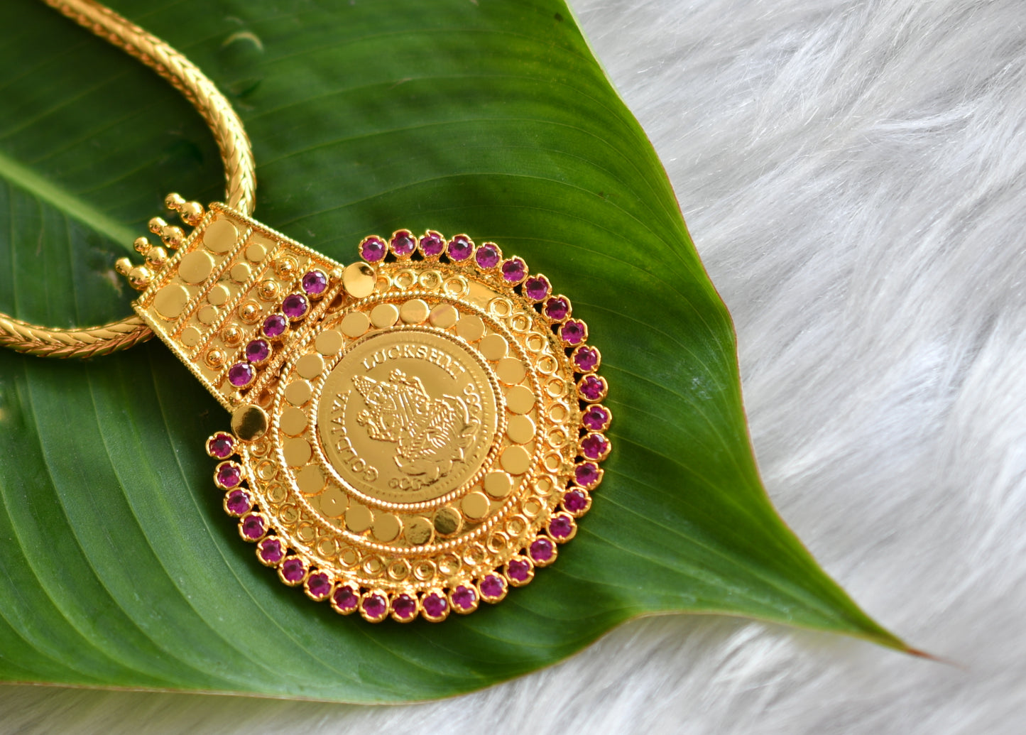 Gold tone ad pink stone Lakshmi pendant with mugappu chain dj-38981