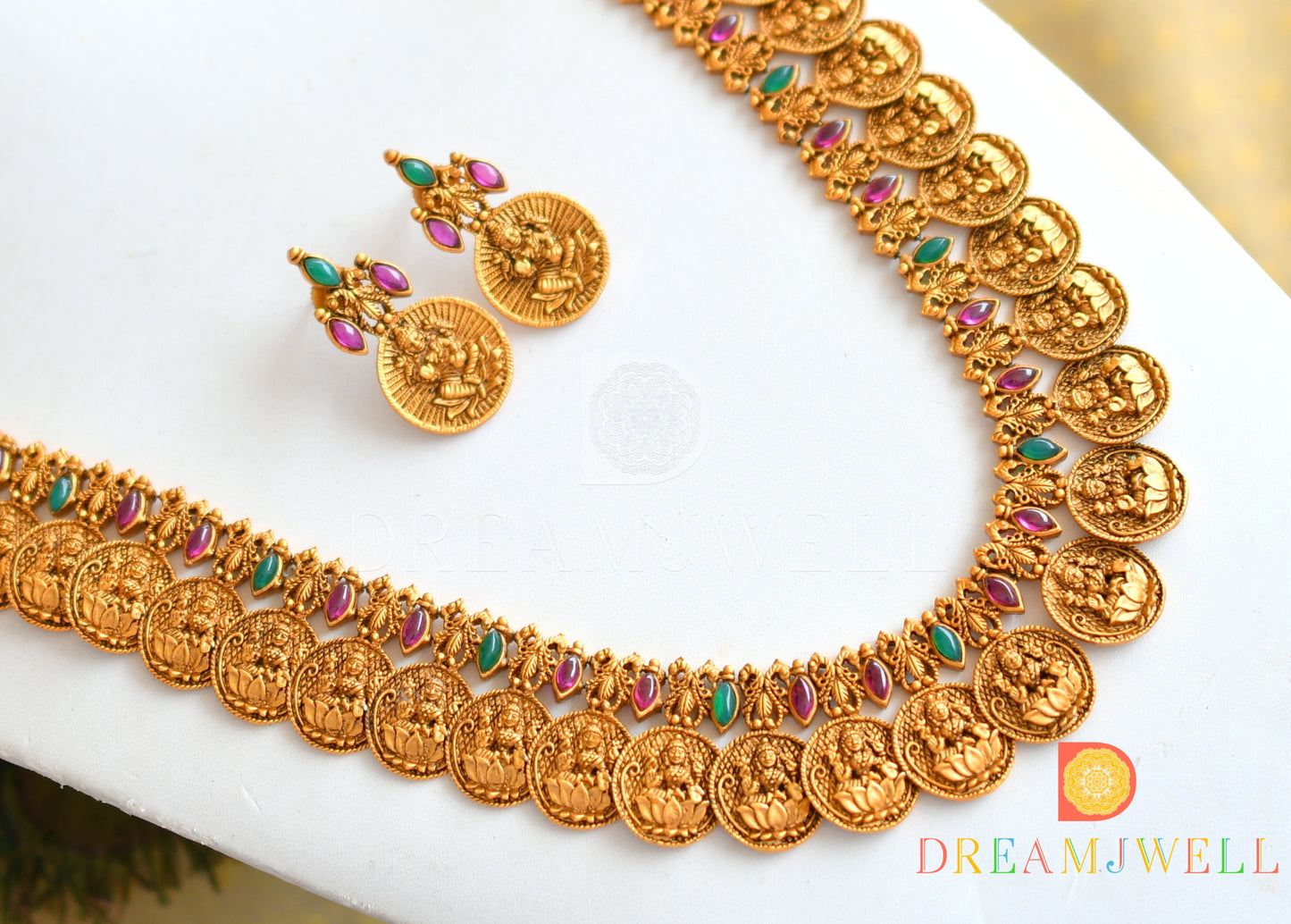 Matte finish kemp-green Lakshmi coin designer short haar set dj-21833