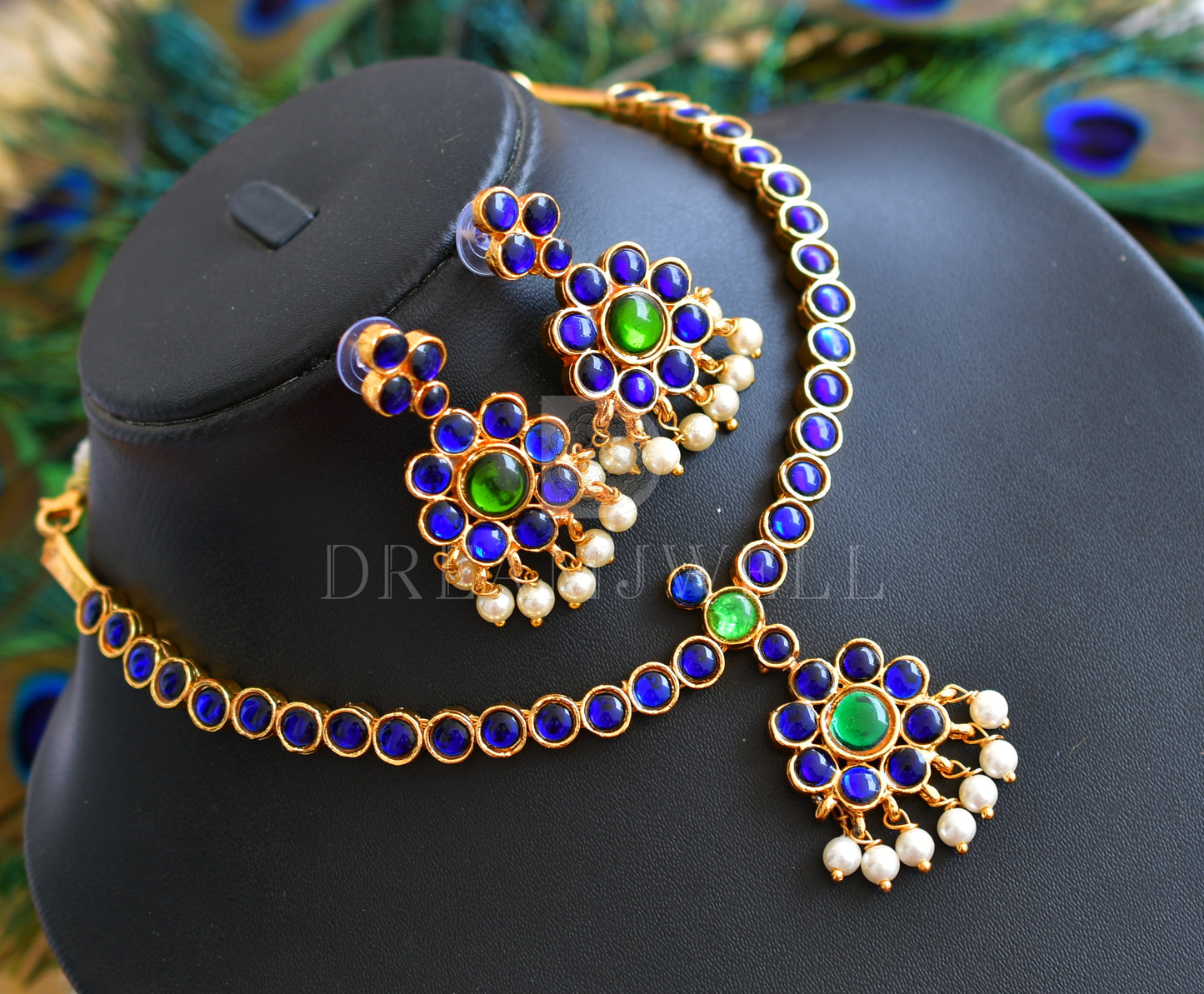 Gold tone blue-green temple necklace set dj-17520