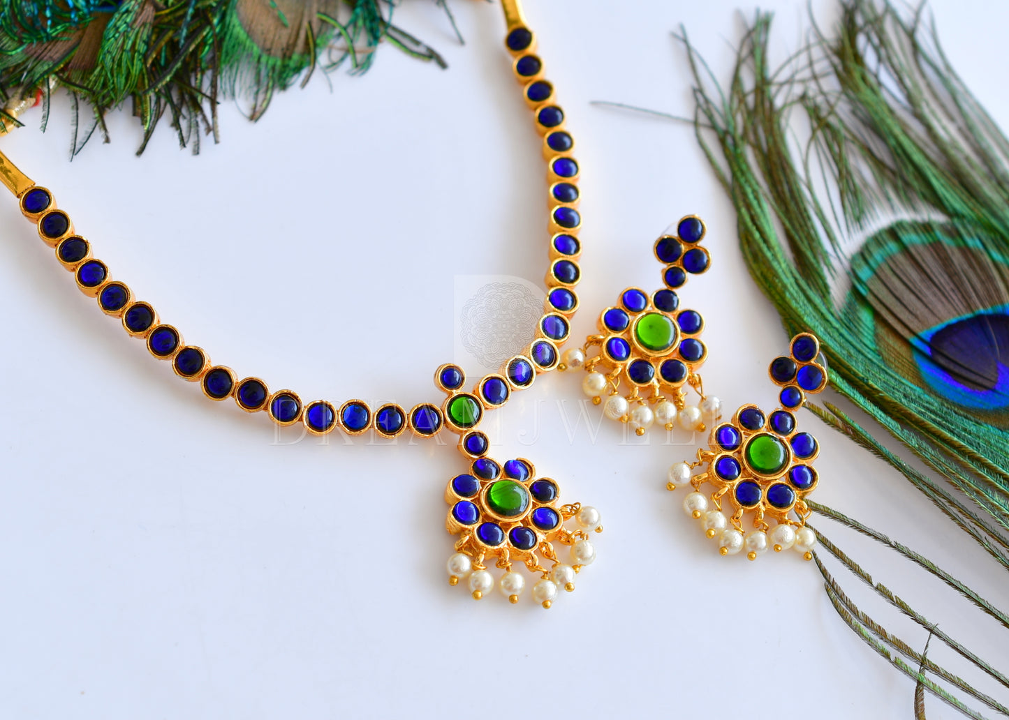 Gold tone blue-green temple necklace set dj-17520