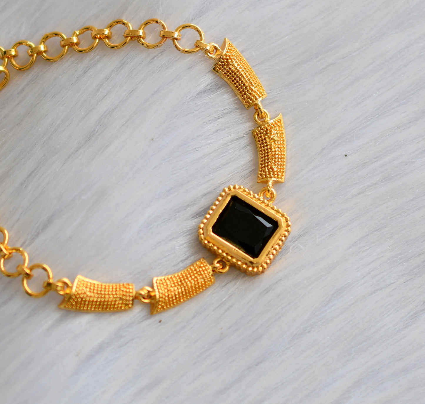 Gold tone black block stone bracelet dj-40491