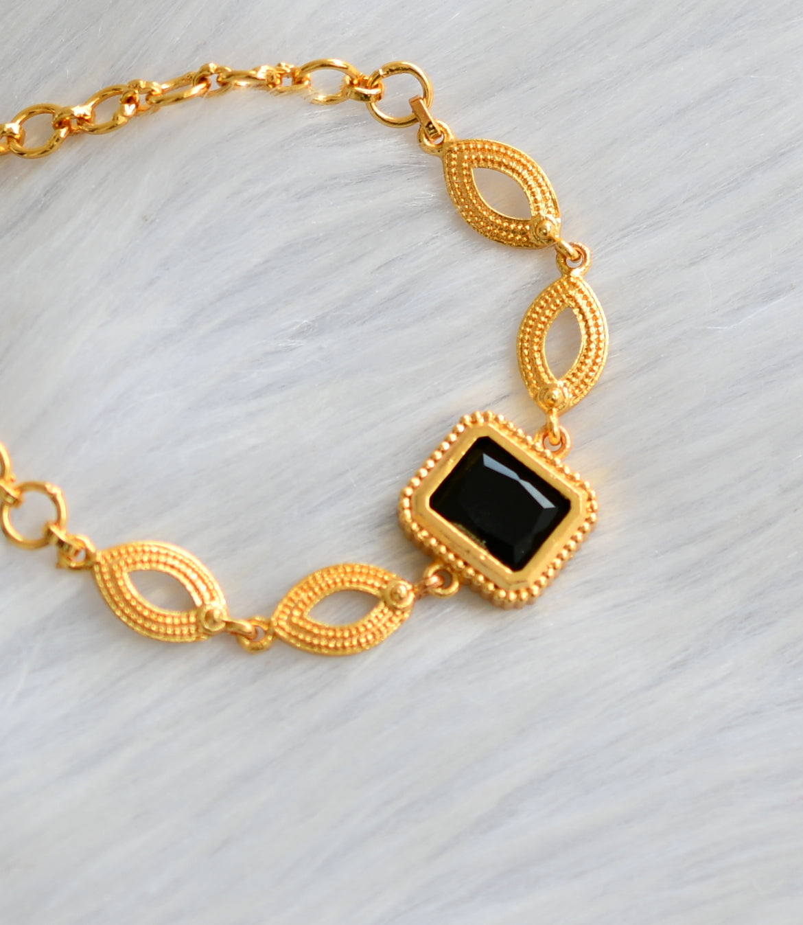 Gold tone black block stone bracelet dj-40495