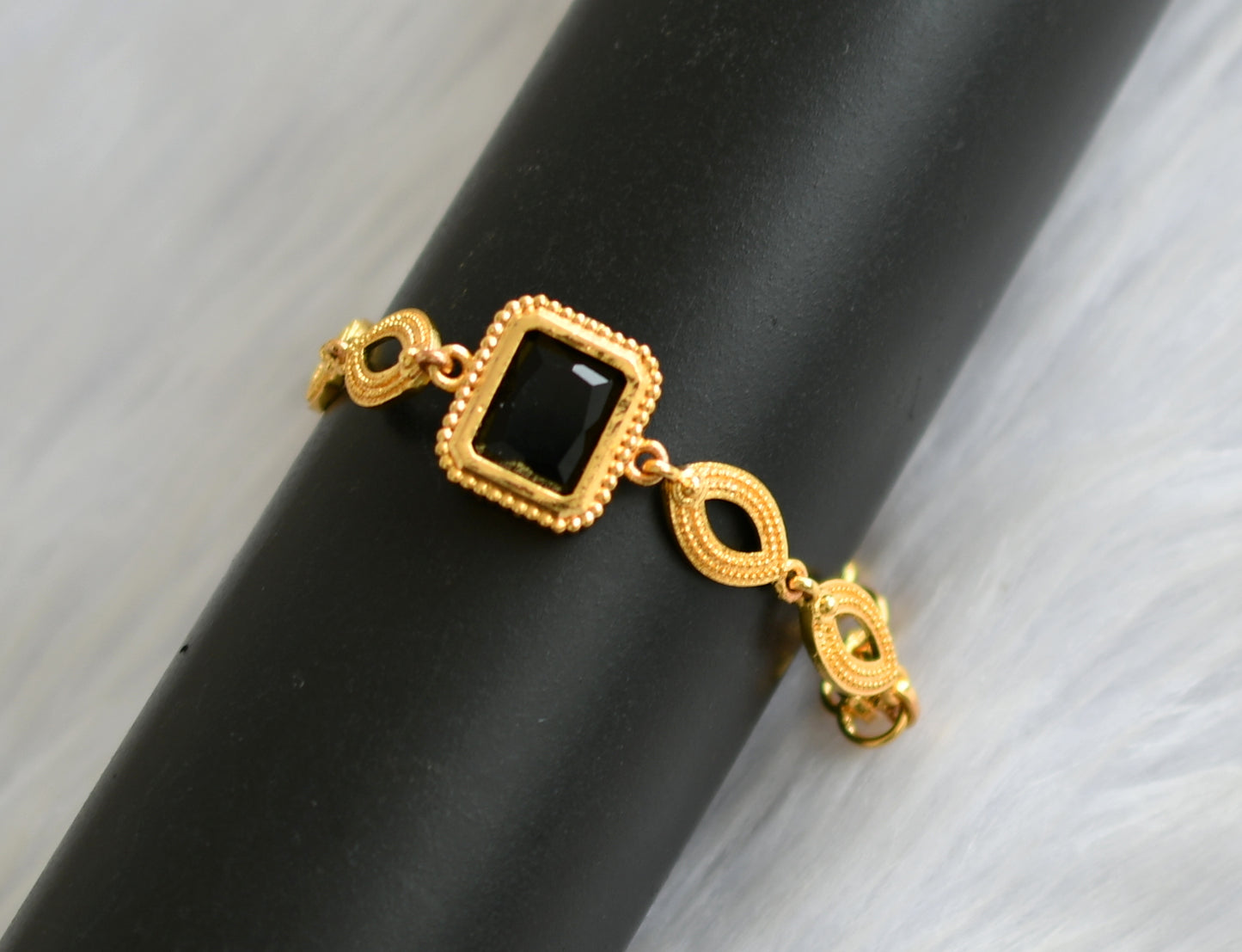 Gold tone black block stone bracelet dj-40495